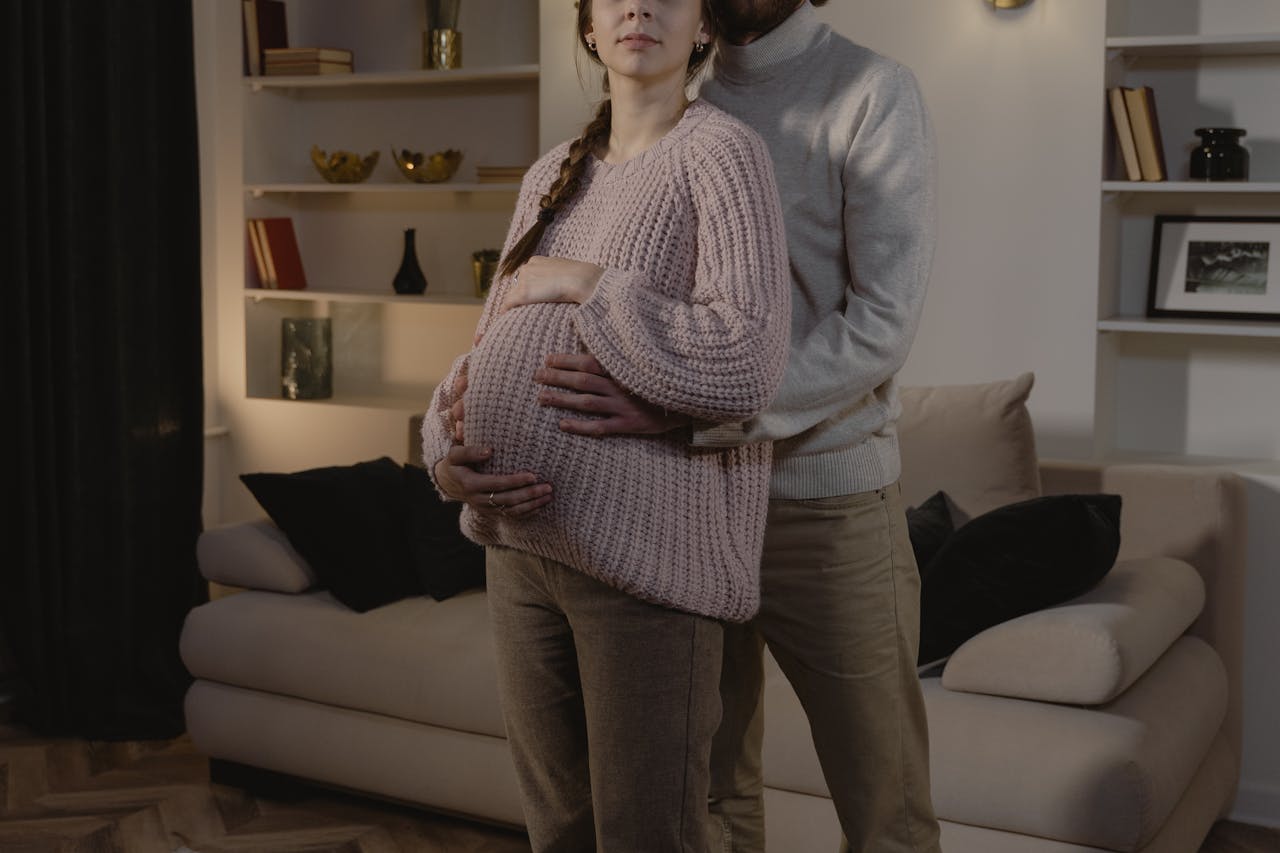 Couple celebrating pregnancy together with warmth and tenderness
